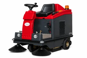 Compact industrial ride-on floor sweeper